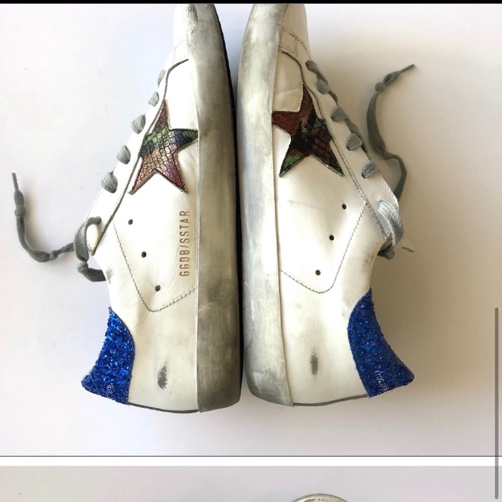 Golden goose sneaks. Uncomfortable for me and cleaning out my closet :)